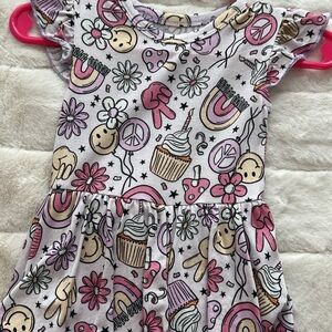 Charming Graphic Kids Dress with Pink and Cream Accents